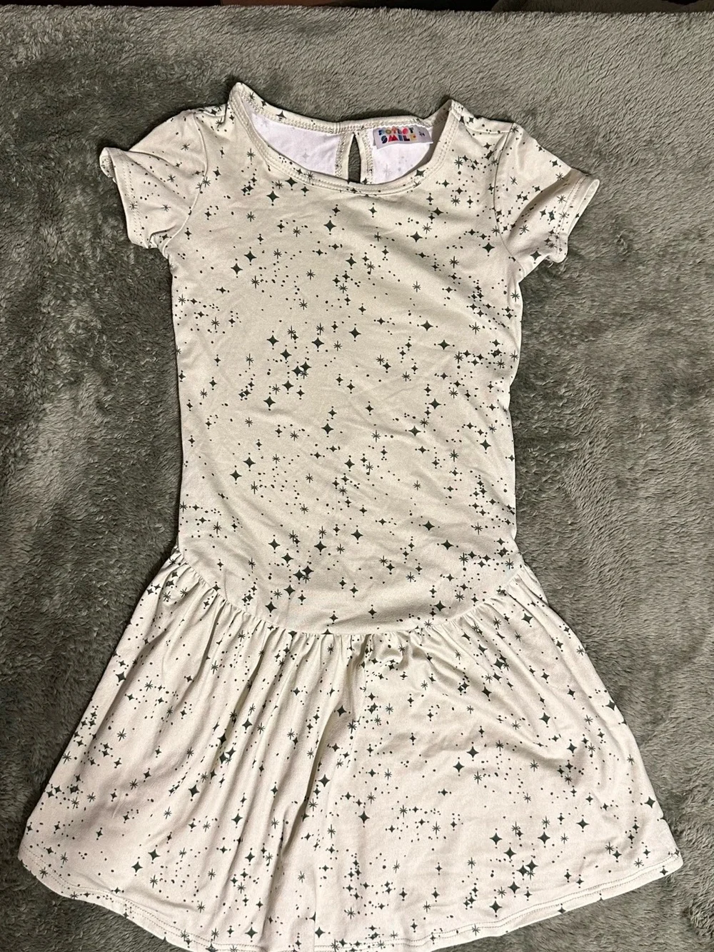 Dot Dot Smile Cream Dress with Black Star Print